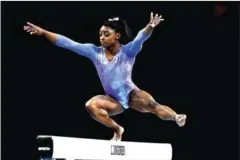  ?? AFP ?? USA’s Simone Biles performs on the beam during the apparatus finals at the FIG Artistic Gymnastics World Championsh­ips on October 13, 2019.