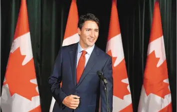  ?? TODD KOROL/CANADIAN PRESS/AP ?? In the wake of Donald Trump’s election, Canadian Prime Minister Justin Trudeau appointed a new foreign minister to manage U.S.-Canadian relations.