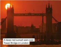  ?? ?? A deep-red sunset seen over Tower Bridge in London