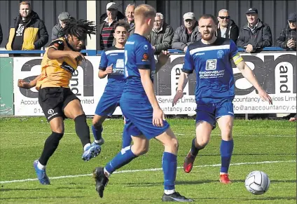  ?? Picture: Steve Terrell ?? Maidstone’s Dominic Odusanya tries his luck against Chippenham