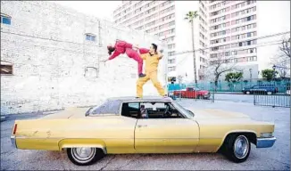  ?? Sean Deckert ?? HEIDI Duckler Dance Theatre performs in unusual places such as this West Hollywood car wash.