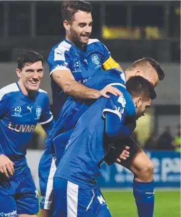  ?? Picture: TONY GOUGH ?? SCORE JOY: South Melbourne players celebrate a goal.