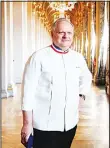  ??  ?? In this file photo taken on Jan 14, 2016, French chef Joel Robuchon poses in a corridor in the Hotel de ville of Paris during the Grand Vermeil award ceremony, rewarding the best
chefs of Paris. (AFP)