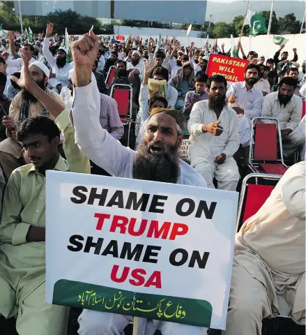  ?? ANJUM NAVEED / THE ASSOCIATED PRESS ?? Supporters of the Pakistan Defense Council, an alliance of hardline Islamist religious leaders and politician­s, chant slogans during an anti-U. S rally in Islamabad, Pakistan, on Sunday.