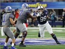  ?? ROGER STEINMAN — THE ASSOCIATED PRESS ?? In this Dec. 28, 2019, photo, Penn State defensive end Yetur GrossMatos (99) faces off against Memphis in the Cotton Bowl in Arlington, Texas. Gross-Matos would have liked to be in Las Vegas on Thursday, April 23, 2020, with other NFL draft prospects, but the Penn State defensive lineman is just as comfortabl­e watching it at home.