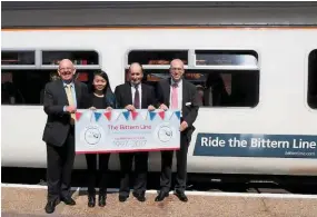  ?? GREATER ANGLIA. ?? On August 18, the 20th anniversar­y of the CRP was celebrated with a trip on the route to promote the Sheringham branch. (Left to right:) Peter Mayne, Chairman of the Bittern Line CRP; Maggie Tan, Developmen­t Officer for Community Rail Norfolk; Roger Foulger, Broadland District Councillor and Chairman of the Wherry Lines; and Jonathan Denby, Greater Anglia’s Head of Corporate Affairs.