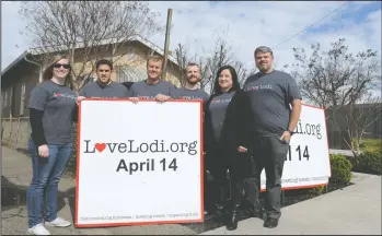  ?? BEA AHBECK/NEWS-SENTINEL ?? From left: Love Lodi’s Liz Stevahn, Augusto Aniano, Pastor Glen Barnes, John Hicks, Kelly Benov and Andrew Manies, stand near the One-Eighty Teen Center in Lodi on Friday.