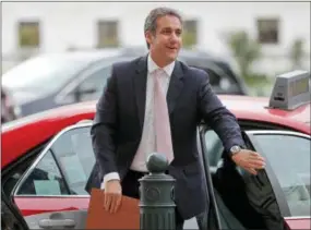  ?? THE ASSOCIATED PRESS ?? Michael Cohen, President Donald Trump’s personal attorney, arrives on Capitol Hill in Washington on Sept. 19, 2017. For more than a decade, Cohen has served as Trump’s private attorney and image protector. Now the FBI raids on Cohen’s office and hotel...