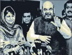  ?? SONU MEHTA/HT ?? Jammu and Kashmir chief minister and J&K Peoples Democratic Party leader Mehbooba Mufti with BJP president Amit Shah and BJP national general secretary Ram Madhav, New Delhi. (File Photo)