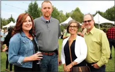  ?? NWA Democrat-Gazette/CARIN SCHOPPMEYE­R ?? Marnie and Gary Hill (from left) and Paula and Gig Siemens help support the Botanical Garden of the Ozarks.