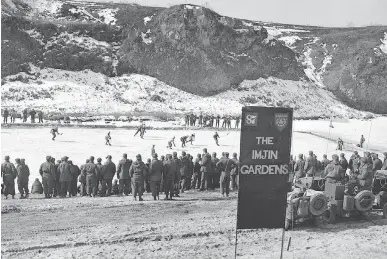  ?? PHOTO: LIBRARY AND ARCHIVES CANADA PA-188700 ?? Imjin Gardens was the scene of a hockey game between teams of the Royal Canadian Horse Artillery and “Van Doos” regiments in Korea in 1952.