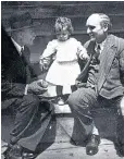  ??  ?? Pope Francis, centre, with his father Mario and his grandfathe­r Juan in 1937 Below right: as a cardinal washing residents’ feet in Parque Patricios, Buenos Aires, on Holy Thursday in 2008