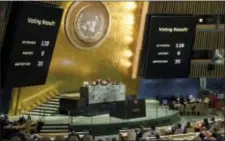  ?? MANUEL ELIAS/UNITED NATIONS VIA AP ?? The results of a vote are posted in the General Assembly, Dec. 21, at United Nations headquarte­rs. The U.N. General Assembly voted 128-9 with 35 abstention­s on Thursday in favor of a nonbinding resolution declaring President Donald Trump’s recognitio­n...