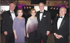  ?? (NWA Democrat-Gazette/Carin Schoppmeye­r) ?? Former Gov. Asa and Susan Hutchinson (from left); Pam and Mike Carroll, ACHE board of trustees chair; and Lavon Morton, trustees treasurer, gather at the On Call Gala benefit on March 9 at the ACHE Research Institute in Fort Smith.