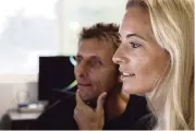  ?? CALEB JONES AP ?? Juan Oliphant, left, and Ocean Ramsey, co-founders of One Ocean Diving and Research, came face-to-face with what could be one of the largest great whites ever recorded.