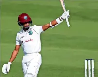  ?? AFP ?? wELL-PLAYEd: west Indies’ Shane dowrich celebrates his half century against England. —