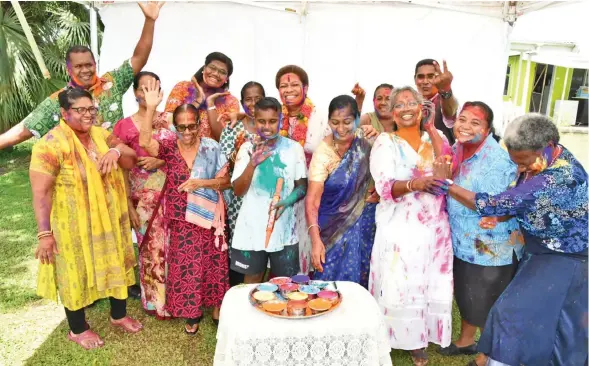  ?? Photo: Ministry of Women, Children and Poverty Alleviatio­n ?? Minister for Women, Children and Poverty Alleviatio­n Mereseini Vuniwaqa (middle) celebratin­g Holi with members of the Women Empowermen­t Group in Navua on March 29, 2021.