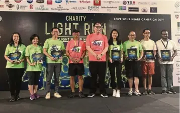  ??  ?? Doing it right: As part of its corporate social responsibi­lity efforts, JHM backed Adventist Hospital’s Charity Light Run in 2019.