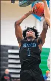  ?? GARY MIDDENDORF/DAILY SOUTHTOWN ?? Hillcrest’s Hamahrie Bowers, shown here against Oak Lawn in December, recorded two dunks on consecutiv­e turnovers Friday.