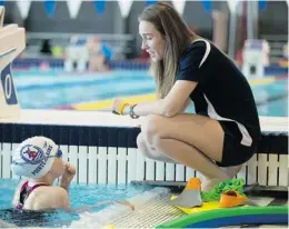  ?? PETER MCCABE, GAZETTE FILES ?? Water sports play a significan­t role in this community. Above, a coach at the Pointe-Claire Aquatic Centre this year instructs one of her young charges; far right, a competitor in the 2011 Speedo Junior Nationals prepares to dive; near right, Olympic...