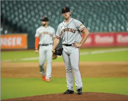  ?? DAVID J. PHILLIP — THE ASSOCIATED PRESS, FILE ?? The Giants’ Caleb Baragar waits to be pulled during the sixth inning of a 2020game against the Astros in Houston.