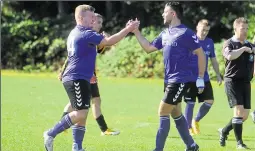  ?? ?? Danny Field (left) celebrates his goal for Woolton Hill
Ref: 40-2121G