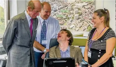  ??  ?? ●●HRH The Duke of Kent speaking to Jamie Preece and his partner Emma about his technology