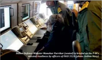  ??  ?? Indian Defence Minister Manohar Parrikar (seated) is briefed on the P-8I’s
                                                                                                                              