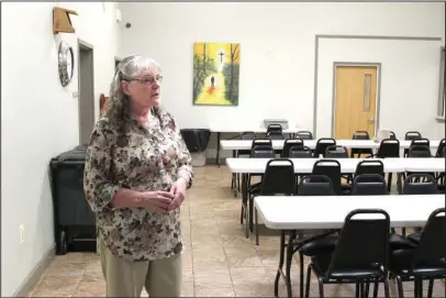  ?? The Sentinel-Record/Richard Rasmussen ?? MINISTRY: Samaritan Ministries Executive Director Jan Laggan gives a tour of the facility located at 131 Sanford St.