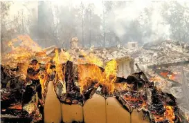  ?? JUSTIN SULLIVAN/AFP ?? El mandatario Trump ordenó ayuda federal por la condición de emergencia.