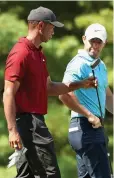  ??  ?? Paired: Woods and McIlroy