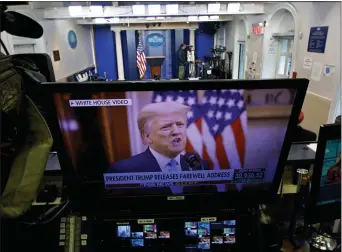  ?? GERALD HERBERT — THE ASSOCIATED PRESS ?? President Trump is seen on a network monitor after his pre-recorded farewell speech was released, inside the Brady Press Briefing Room at the White House, Tuesday, Jan. 19, 2021, in Washington.