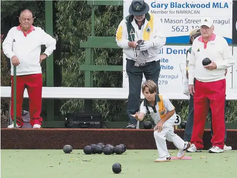  ??  ?? Ten-year-old Fletcher Pallot looks poised bowling in Warragul’s division six match against Trafalgar.