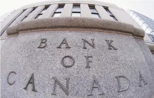  ??  ?? Avec sa décision de mercredi, la banque centrale établissai­t son taux directeur à 1,75% pour une septième fois de suite. - La Presse canadienne: Adrian Wyld