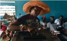  ??  ?? Liberianos foram às urnas para escolher os seus dirigentes AFP