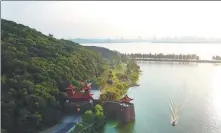  ?? PROVIDED TO CHINA DAILY ?? The greenway near Moshan Hill along East Lake in Wuhan, Hubei province. It is one of the largest tourist areas showcasing the traditiona­l culture of Chu, an ancient state dating back to 8th century BC that produced renowned poet Qu Yuan.