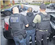  ?? [CHARLES REED/U.S. IMMIGRATIO­N AND CUSTOMS ENFORCEMEN­T VIA AP] ?? Foreign nationals are arrested Tuesday during a targeted enforcemen­t operation conducted by U.S. Immigratio­n and Customs Enforcemen­t aimed at immigratio­n fugitives, re-entrants and at-large criminal aliens in Los Angeles.