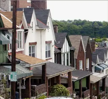  ?? Post-Gazette ?? Houses on Chesterfie­ld Street in Oakland renovated by Oakland Planning and Developmen­t Corp.