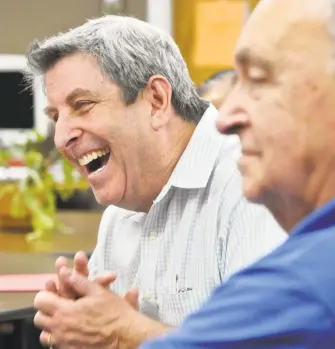  ?? H. John Voorhees III / Hearst Connecticu­t Media file photo ?? Bob Becker, of Bethel, reacts to a member’s comments on a story from a member of a weekly memoir writing class, at the Bethel Senior Center. Becker is the facilitato­r of the class.