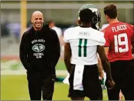  ?? Seth Wenig / Associated Press ?? Jets coach Robert Saleh smiles during a May 24 practice in Florham Park, N.J.