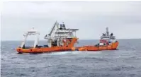  ?? — Reuters ?? Chinese rescue ships work to clean oil slicks from the sunken Iranian oil tanker Sanchi in the East China Sea.