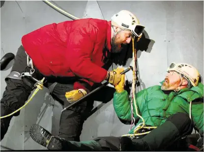  ?? Courtesy ?? L. Robert Westeen, left, and Trevor B. Cone rehearse for “K2” a play featuring two climbers on an icy ledge of the world’s second-highest mountain. The pair practiced with a Houston climbing instructor so their actions would appear realistic.