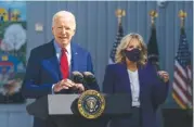  ?? AP PHOTO/MANUEL BALCE CENETA ?? President Joe Biden, with first lady Jill Biden, speaks during a visit at Brookland Middle School in northeast Washington, on Friday.