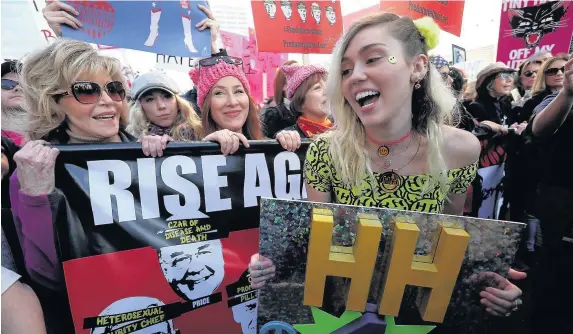  ?? Justin Sullivan ?? > Acting her age? 79-year-old Jane Fonda, left, pictured on a Women’s March in Los Angeles with singer Miley Cyrus
