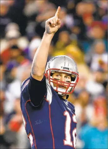  ?? Jim Rogash Getty Images ?? TOM BRADY, WHO MIGHT be the No. 1 quarterbac­k of all time, is expected to sign with the Tampa Bay Buccaneers today after an amazing nine Super Bowl appearance­s in 20 seasons with the Patriots.