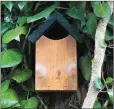  ??  ?? A robin box (left) and bee hotel providing shelter for wildlife.