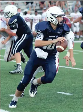  ??  ?? Quarterbac­k Austin Thompson and the Gordon Lee Trojans are hoping to get back to the top of Region 6-A ‘A’ and earn the team’s first state playoff berth since 2012. (Catoosa News file photo/Scott Herpst)