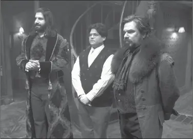  ?? John P Johnson/AP ?? Series: This image released by FX shows Kayvan Novak, form left, Harvey Guillen and Matt Berry in a scene from "What We Do In the Shadows." The series premiering Wednesday is based on the 2014 cult-hit movie from New Zealand.