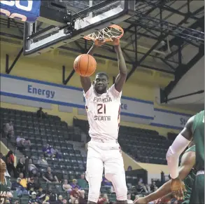  ?? Phelan M. Ebenhack / Associated Press ?? Center Christ Koumadje and Florida State face UConn on Saturday at the Prudential Center in Newark, N.J.