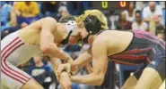  ?? SAM STEWART - DIGITAL FIRST MEDIA ?? Boyertown’s David Campbell works against Owen J. Roberts’ Luke Resnick during the 120 final last weekend.